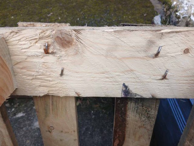 Checking for bent nails is the first step when pallet breaking.