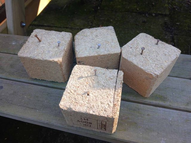 Pallet blocks with nails still embedded.