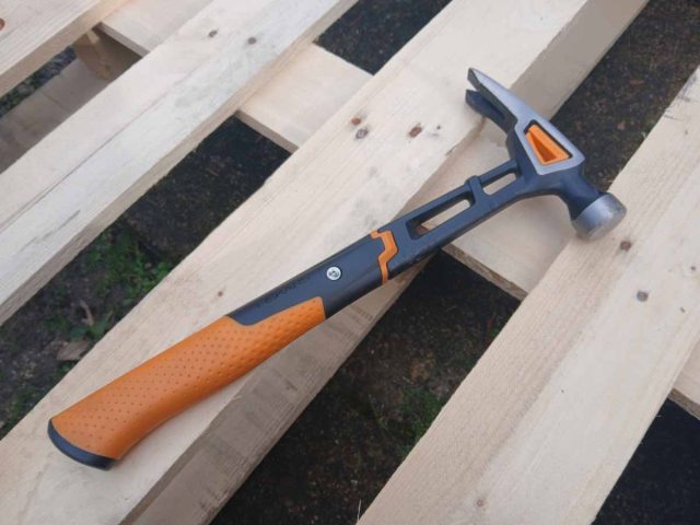 The Fiskars® IsoCore 16oz Finishing Hammer. Although, any claw hammer will do.