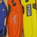 Folding Utility Knife Comparison Header Image. Close-up of handles.